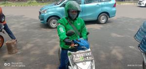 Gojek dan Grab Hapus Sementara Fitur Angkut Penumpang